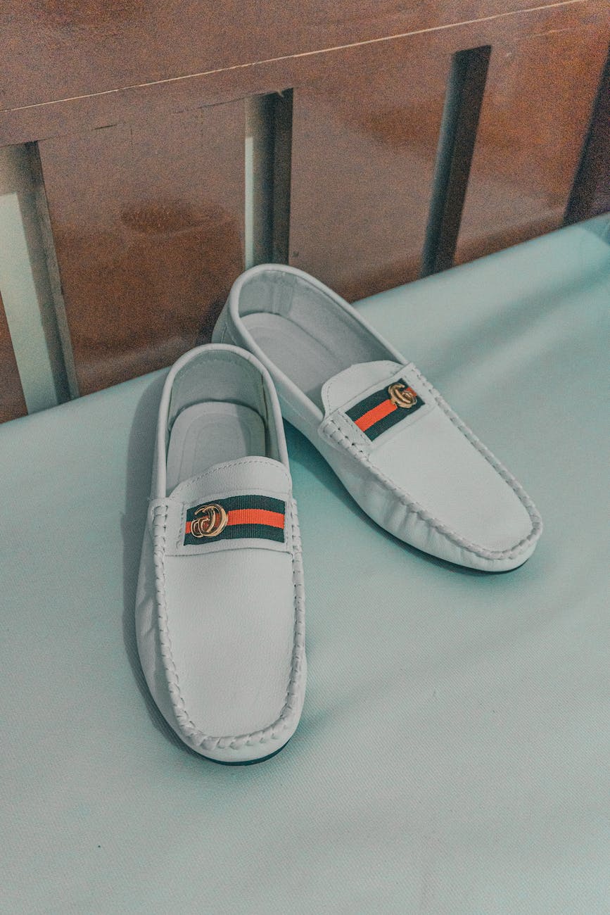 close up shot of white loafers