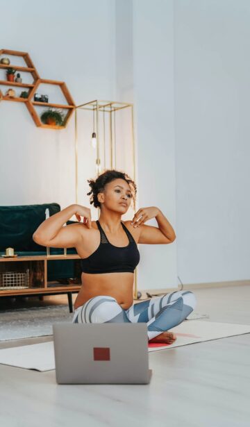 a woman in activewear doing yoga